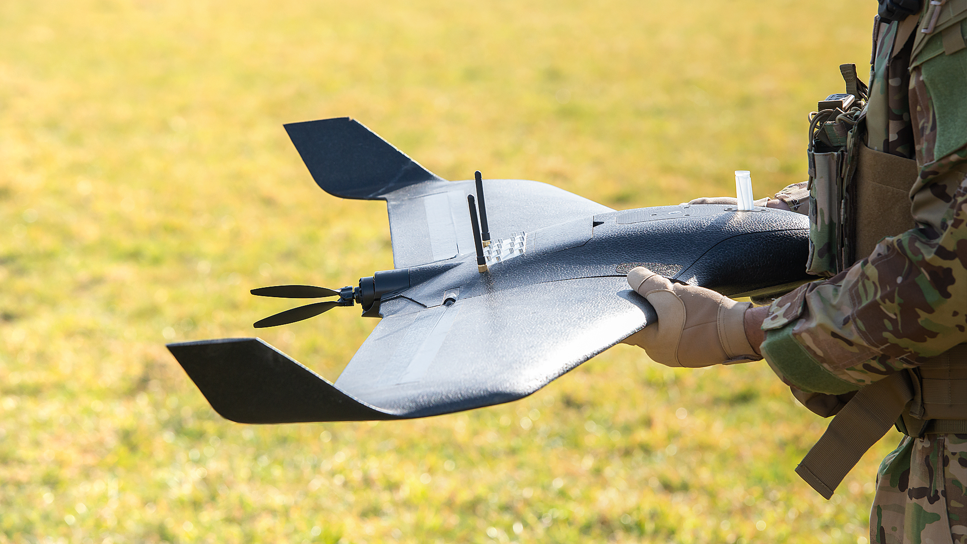 A military holding the eBee VISION ISR drone